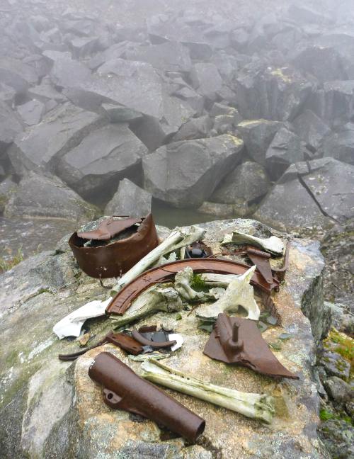 Artifacts are piled with rocks on the Chilkoot Trail
