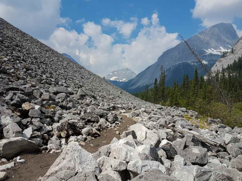 A trail winds through the mountains