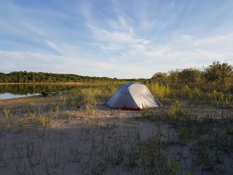A tent on the shore of the Saskatchewan River