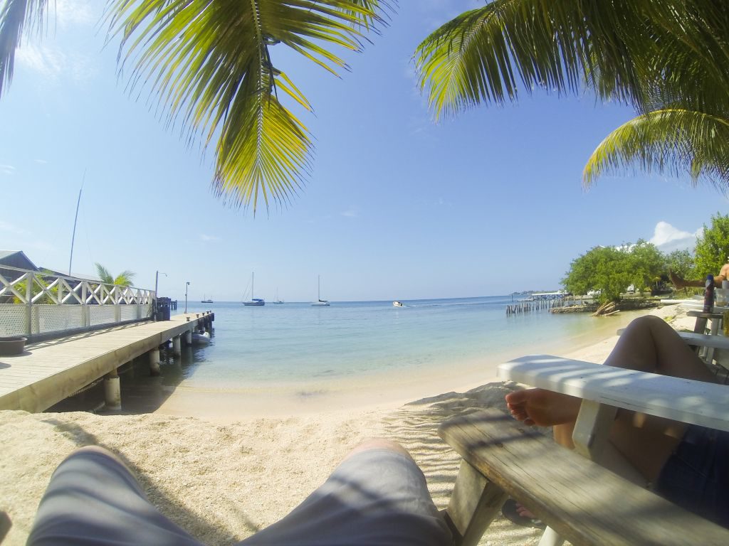 Lounge chairs on beach on Utila Island Honduras
